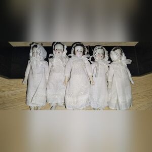 Set of Five Porcelain Dolls in White Dresses